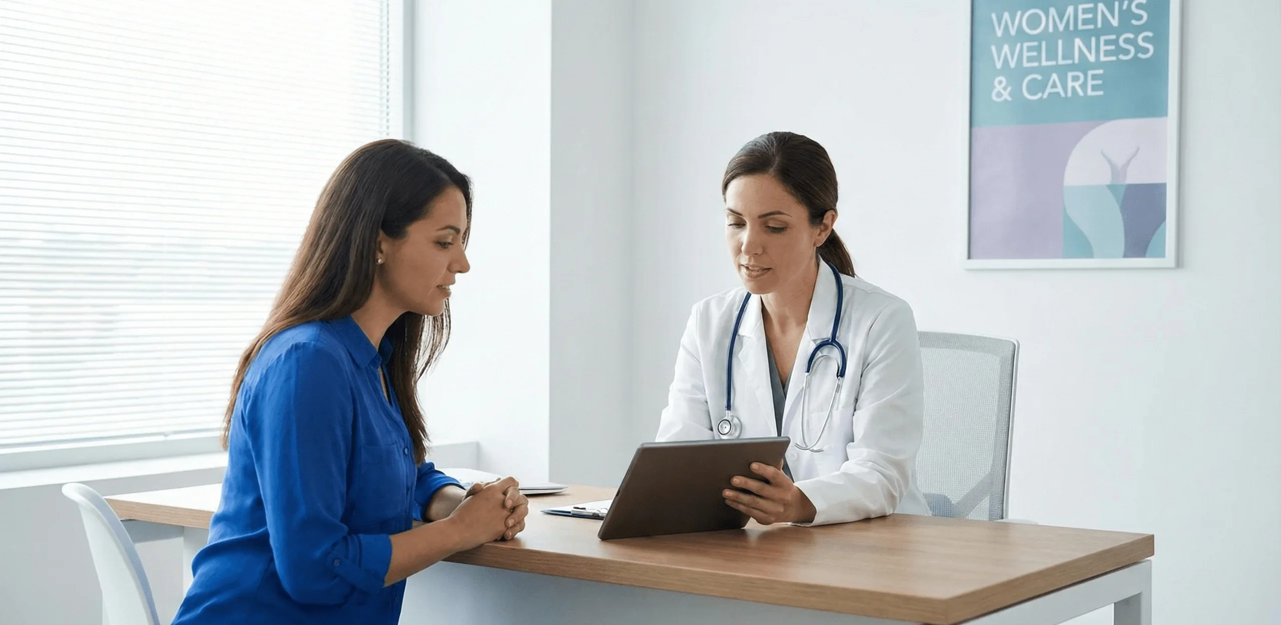 Gynecologist consulting a woman for women’s health and gynecology care in a clinic.